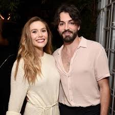 Added 4 days ago by lovedriver. Elizabeth Olsen Just Casually Revealed She S Married To Robbie Arnett E Online Deutschland