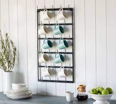 There are a mix of countertop designs and wall designs. Vintage Blacksmith Wall Mug Rack Large Kitchen Accessories Pottery Barn