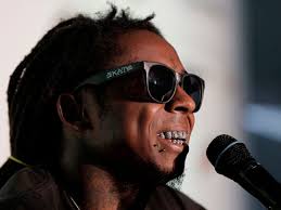 Lil Wayne tops Elvis Presley's Billboard record