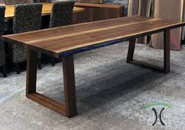 Black Walnut Live Edge Dining Table On Inverted Sapele Trapezoid Legs At Living Ed Live Edge Slab Dining Table Live Edge Walnut Dining Table Slab Dining Tables
