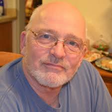 Does anyone have an old picture of the altar area with the crucifix