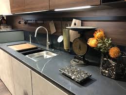 Shown here, stainless steel countertops in a kitchen featured in steal this look: Sophisticated Kitchen Designs With Black Countertops