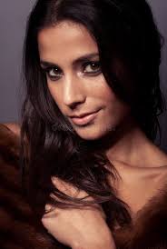 Model in Lacy Garment Flicking Hair Stock Image