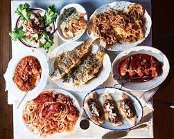 Each christmas eve, families and friends gather to celebrate the feast of the seven fishes. What Christmas Dinner Looks Like Around The World