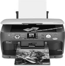 Hold the ink cartridge with the arrow mark facing up and pointing to the rear of the printer, and then insert it in the slot. 2