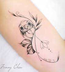 The mickey mouse dream catcher tattoo is awesome for a free spirited guy. Disney Tattoos Tat2o