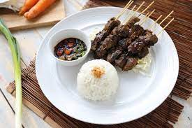 While traveling through indonesia, malaysia, and singapore, my wife, adri, and i made it a point to try every kind of satay—little chunks of marinated meat threaded onto bamboo skewers, grilled over. Premium Photo Sate Kambing Indonesian Lamb Satay