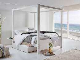 The design is simple, classic, and stylish, bringing a peaceful and harmonious beauty to your bedroom. Four Poster Bed Summer Get Laid Beds