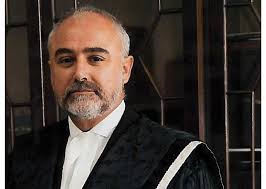 Three Judges and three Magistrates being sworn into office