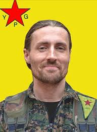 First American volunteer to die fighting ISIS abroad is buried