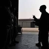 US Air Force (USAF) Major (MAJ) Michelle Galarneau, a Nurse assigned to the  169th Medical Squadron, gives a Smallpox vaccination to SENIOR AIRMAN (SRA) Calvin  Adger, 169th Maintenance Squadron, as USAF Airmen