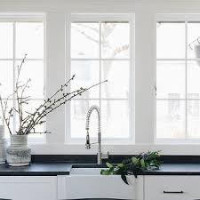 Looking for modern white kitchen cabinet ideas? White Kitchen Cabinets With White Granite Countertops Design Ideas