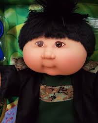 This cute little nugget is Nancy Raine! She is one of the newest kids to my  collection. She is a 16” Play Along Cabbage Patch. While they look newer,  they still are