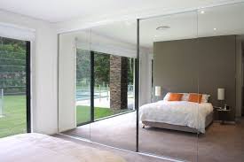 Sliding mirror closet doors for bedrooms. The Sliding Mirror Closet Doors Are Plycorr A Densely Corrugated Cardboar Sliding Door Wardrobe Designs Sliding Mirror Closet Doors Mirrored Wardrobe Doors
