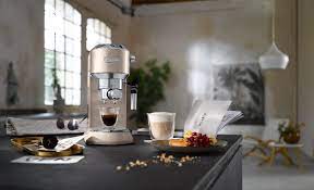 The delonghi ec 680.m/bk/r dedica espresso machine is a compact, reliable and classy solution for coffee lovers who want some kind of automation (automatic dosage, serving size memory) and speed (a heat block that is ready for. De Longhi Dedica Style Ec 685 Bk Espresso Filter Holder Espresso Machine With Professional Milk Foam Nozzle 15 Cm Wide 1 Litre Water Tank Full Metal Casing E S E Pads Beige Amazon De Home