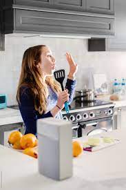 Supper's done and table's clear baby wants a bottle and i want beer. Teen Girl Singing To Music In The Kitchen By Gillian Vann Singing Music