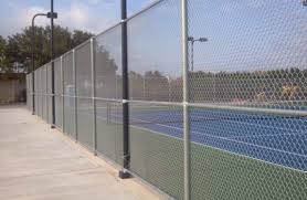 A very simple solution to a not so pretty chain link fence is using wood slats. Commercial Chain Link Viking Fence