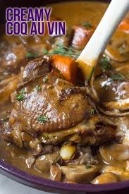 Creamy Coq Au Vin Recipe A Rustic Classic French Chicken Dish With A Luxurious Creamy Wine Sauce Mushroom Coq Au Vin Recipe French Chicken Dishes Coq Au Vin
