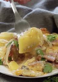 A delicous scalloped potato gratin recipe made with thinly sliced yukon gold potatoes layered with cheese and a light buttery sauce. Slow Cooker Scalloped Potatoes Ham Easy Crockpot Potatoes