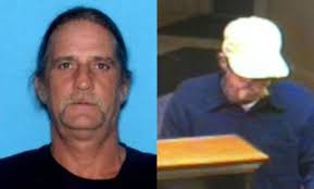 55-year-old man wanted, accused of robbing a Theodore bank
