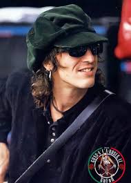Izzy Stradlin, the enigmatic rockstar, has carved a unique place in music  history with his phenomenal talent and mysterious persona. As a founding  member and rhythm guitarist of the legendary band Guns