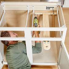 Kitchen Cabinet Storage Solutions Diy Pot And Pan Pullout Kitchen Cabinet Storage Kitchen Cabinet Storage Solutions Cabinet Storage Solutions