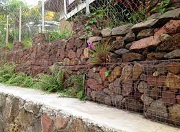 Gabion Retaining Wall Fence Gabion Atop A 6 Moss Rock Wall And Dry Stack Portion Provides Superior Retaining Wall Design Gabion Retaining Wall Gabion Wall