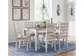 Skempton Dining Table And Chairs Set Of 7 Ashley Furniture Homestore In 2020 Dining Room Table Dining Table Chairs Dining Room Table Set