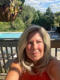 What hairstyle should I get, bob or layers, as a 54-year-old woman with  thick hair?