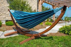 The double hammock is tightly woven with high quality cotton thread resulting in a heavy, durable fabric. Outdoor Double Cotton Hammock Blue Lagoon With Solid Pine Stand Ashley Furniture Homestore
