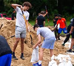 Marion County residents take shelter; FHS basketball team volunteers during  Hurricane Milton