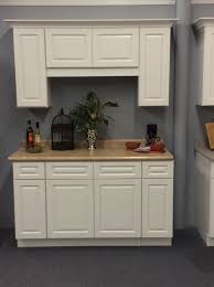white raised panel starter kitchen