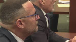Lorain County Prosecutor J.D. Tomlinson, chief of staff appear in court