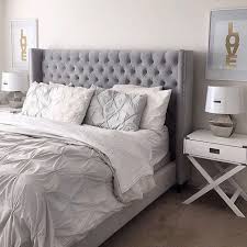 In the bedroom, he set a gray spindle bed against the white painted walls and then topped it with a mix of blue and white striped bedding. 11 Best Grey Upholstered Bed Ideas Bedroom Inspirations Bedroom Design Master Bedrooms Decor