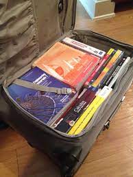 Lpt When Moving Pack Heavy Items Like Books In A Rolling Suitcase Boxes Are Hard To Carry And Tend To Tear When They Re Too Heavy Moving Hacks Packing Moving Help Moving