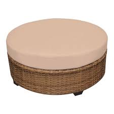 This round cocktail table features a unique wicker surface that is supported by a sturdy frame and finished in a warm umber finish. Tkc Laguna Outdoor Wicker Round Coffee Table In Wheat Tkc025b Ctrnd Wheat