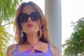 Bella Thorne Celebrates Her 26th Birthday in a Purple Bikini
