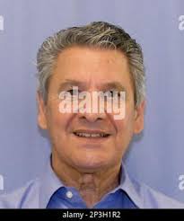 FILE This Feb. 9, 2015, file photo, Robert Englert walks with his daughter  Alicia Englert following court, in Salt Lake City. Englert, a Utah woman  accused of leaving her newborn in the