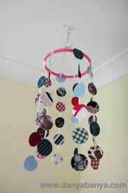 The texture of the bubble wrap creates some lovely patterns, and babies will have fun popping bubbles and making art at the same time! Getting Ready For The Baby Hanging Mobile Danya Banya