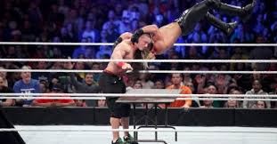 John Cena Vs Seth Rollins Tables Match Photos John Cena Seth Rollins Photo