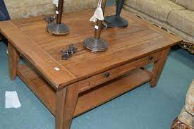 This rectangular cocktail table will match any home decor. Country Style Coffee Table Attic Heirlooms By Broyhill And A Multi Tier Side Table