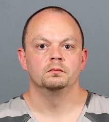 Man charged in case involving slain, abused adopted children