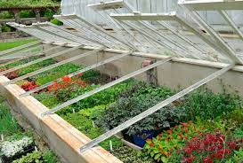 If you are passionate about gardening and have a small space but want to have a greenhouse then this post is for you. Glass Recycling For Greenhouse Designs Garden Houses Built With Salvaged Wood Windows