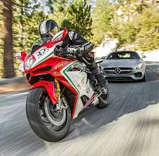 Mercedes Amg Gts Vs Mv Agusta F4 Mv Agusta Super Bikes Cool Motorcycles