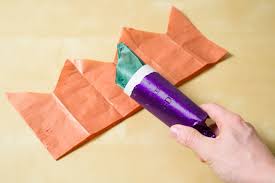 These diy christmas crackers are an easy and creative way to add your own treats to christmas crackers. How To Make Paper Party Hats For Christmas Crackers Ehow Diy Christmas Crackers Homemade Christmas Crackers Christmas Crackers