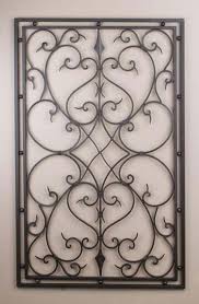 Made of wrought iron wall art with a beautiful pattern is an excellent way to bring a unique atmosphere to the decor. Wrought Iron Panel Wrought Iron Wall Decor Iron Wall Decor Wall Grille