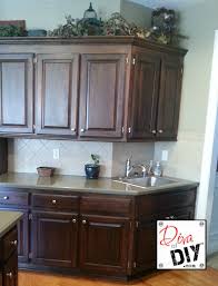 Oak Cabinet Makeover How To Paint Like A Professional Stained Kitchen Cabinets Staining Cabinets Kitchen Cabinets