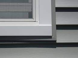 Vinyl Siding And Window Trim Installation The Windowman Plus Vinyl Siding Vinyl Siding Trim Gray Vinyl Siding