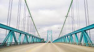 The bridge project was conceptualised and began as the detroit river international crossing (dric) in 2004. Ambassador Bridge Owner Manuel Moroun Asks Trump To Halt Gordie Howe Bridge Project Transport Topics