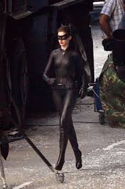 For those who don't know their batman lore, selina kyle is. See Anne Hathaway S Catwoman Ears And Killer Apple On The Set Of Dark Knight Rises